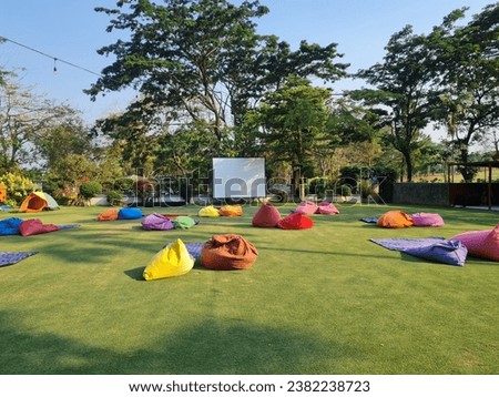 colorful bean bags outdoors.  bean bag in green grass park. Royalty-Free Stock Photo #2382238723