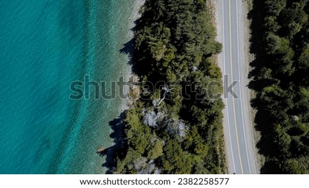 blue lake with a road