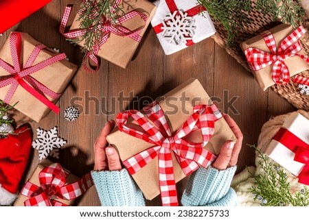 Boxing day sale seasonal promotion background. Various presents gift box with ribbon, with inscription frame Boxing day, block wooden calendar, wrapping holiday paper, Christmas decor, ribbons Royalty-Free Stock Photo #2382275733