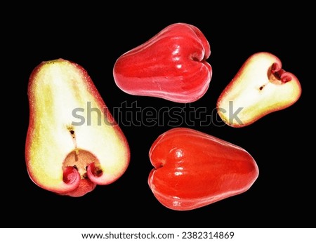 Red water apple fruit isolated with clipping path no shadow in black background, healthy tropical fruit