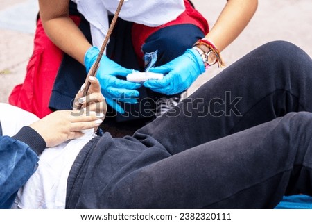 First aid for an abdominal injury Royalty-Free Stock Photo #2382320111