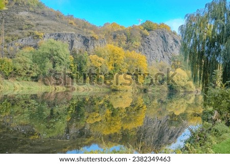 Beautiful views of the autumn river Berounka, forest and mountains, Czech. Royalty-Free Stock Photo #2382349463