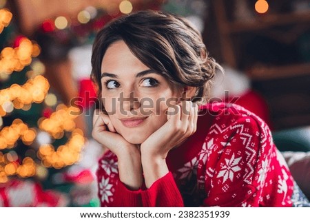 Photo of pretty young woman hands cheekbones comfortable dreaming presents waiting santa claus magic isolated home decor background
