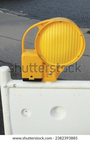 construction sign, barrier, yellow circle, symbol, construction fencing, fence, construction, construction, structures