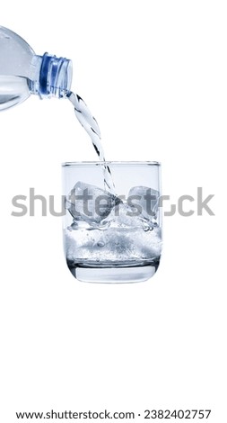 Pour water into a glass with ice inside,With Clipping Path,Edit pictures with a blue filter.
