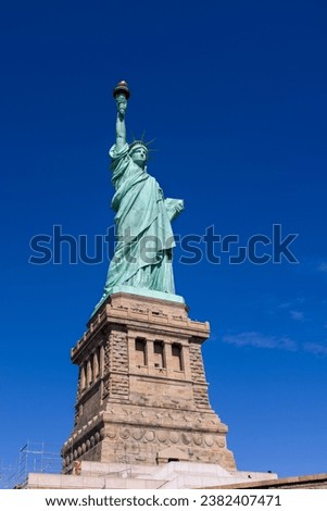 The Status of Liberty with blue sky background