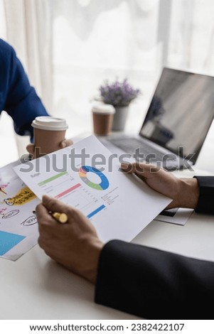 Vertical image of business financial analyst on investment project planning during discussion in company meeting showing successful teamwork. Close-up pictures