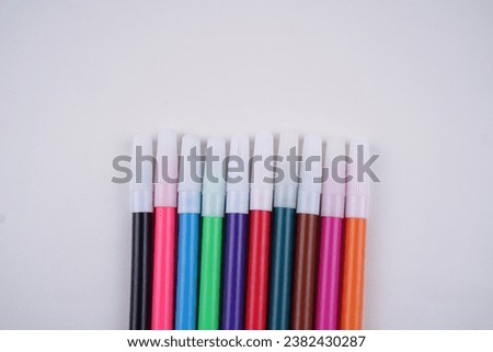 This object is a color marker with an aesthetic white background