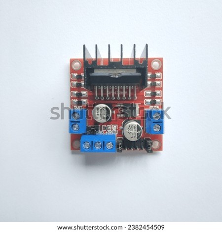The L298N Motor Driver Module is an essential component for controlling and driving electric motors, particularly in robotics and mechatronics applications. This module, based on the L298N dual H-brid Royalty-Free Stock Photo #2382454509