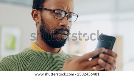 Reading email, black man and a phone for communication, online chat or app notification. Home, contact and an African person typing on a mobile for a search, website or connection on the internet