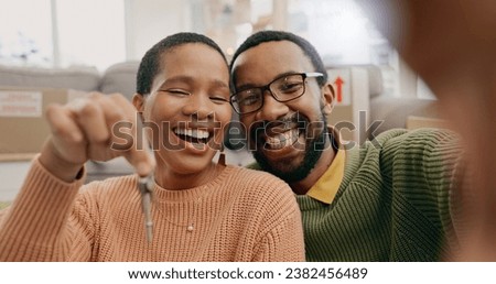 Black couple, portrait and a selfie with keys in a new home after moving and relocation. Smile, showing and an African man and woman excited with a photo for ownership or buying of a house together Royalty-Free Stock Photo #2382456489