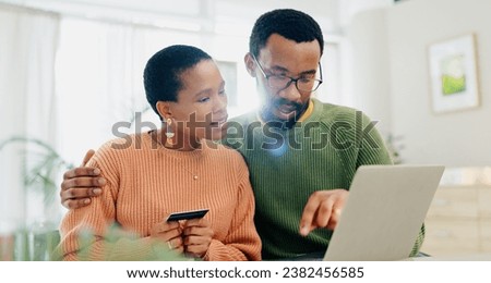 Payment, credit card and a black couple with a laptop for online shopping, banking or search on website. Ecommerce, house and an African man and woman reading information to pay from an email