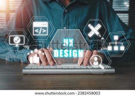 UX design concept, Person hand typing on keyboad computer with UX design icon on virtual screen.