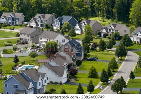 Aerial view of large private homes in Rochester, NY residential area. New family houses as example of real estate development in american suburbs Royalty-Free Stock Photo #2382460749