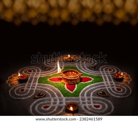 Clay diya lamps lit during diwali celebration, Diwali, or Deepavali, is India's biggest and most important holiday. Royalty-Free Stock Photo #2382461589