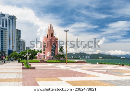 Awesome view of Tram Huong Tower and April 2 Square in Nha Trang, Vietnam. The central square is a popular tourist attraction of Asia. Amazing cityscape. Royalty-Free Stock Photo #2382478821