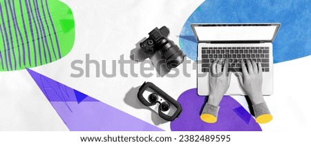 Laptop computer with a SLR camera and VR from above