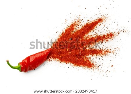 Pile of red paprika powder isolated on white background Royalty-Free Stock Photo #2382493417