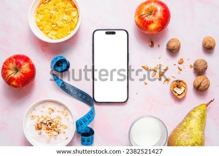 Healthy eating, taking care of your figure and following a diet. Flat lay photo showing a smartphone mockup and healthy eating. Concept showing calorie counting and diet