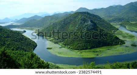 Lake Skadar is the largest lake in the Balkan peninsula.The lake is located on the border between Albania and Montenegro, about 2-3 of the surface belongs to the latter. Royalty-Free Stock Photo #2382574491