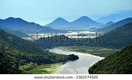 Lake Skadar is the largest lake in the Balkan peninsula.The lake is located on the border between Albania and Montenegro, about 2-3 of the surface belongs to the latter. Royalty-Free Stock Photo #2382574505