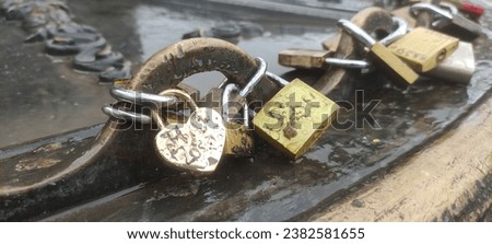 Padlocks intertwined and tied as a symbol of love