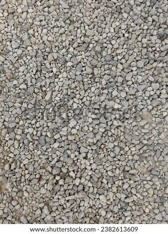 crushed rock or stone texture, gravel or pabble background, building and architecture design material, flooring graphic resource