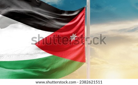 Jordan national flag waving in beautiful sky. The flag waving with dynamic angle.