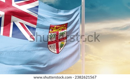 Fiji national flag waving in beautiful sky. The flag waving with dynamic angle.