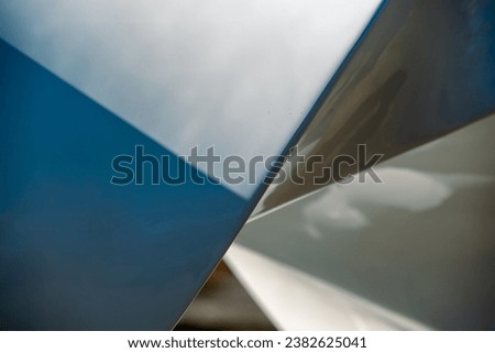blue and gray abstract background from curved lines of geometric shapes minimalistic design pattern