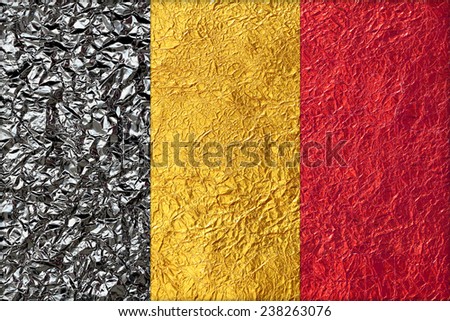 Belgium Flag with a Shiny  leaf  Bronze Shiny  leaf   foil texture background