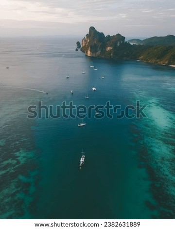 Body of Water and Green Mountains, Serene Island Getaway: a Tranquil Aerial View of Turquoise Waters and Unspoiled Coastline, A serene paradise of turquoise waters, sandy beaches, and distant islands.