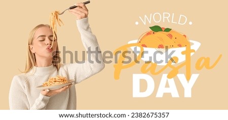Young woman eating tasty pasta on beige background. World Pasta Day Royalty-Free Stock Photo #2382675357