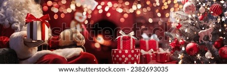 Santa Claus with a gift in his hand near the Christmas tree and fireplace with fire. Holiday Background