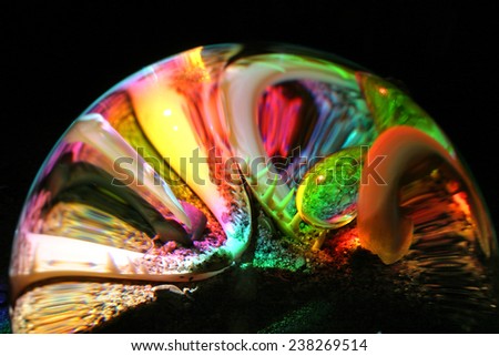 still life illuminated spectral colors of the ball through the