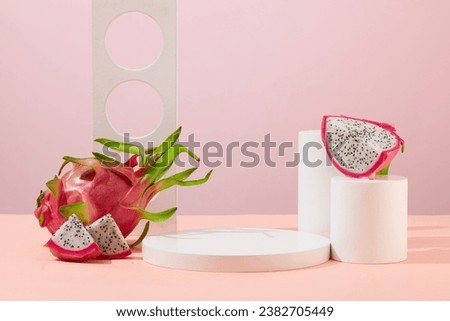 Space on white platforms is used to display products, decorated with fresh dragon fruit. Dragon fruit is considered a natural moisturizer because it contains about 80% water and contains many vitamins