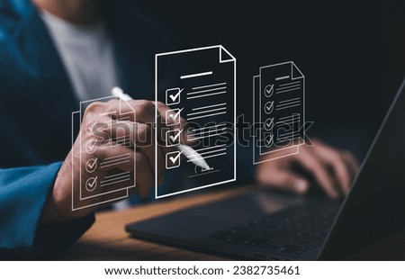 E-document management Paperless workplace, e-signing, electronic signature, document management. A businessman signs an electronic document, E-signing. Technology and document management.