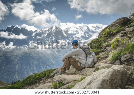 Hiker looking to Mont Blanc from Brevent, Tour du Mont Blanc Royalty-Free Stock Photo #2382738041