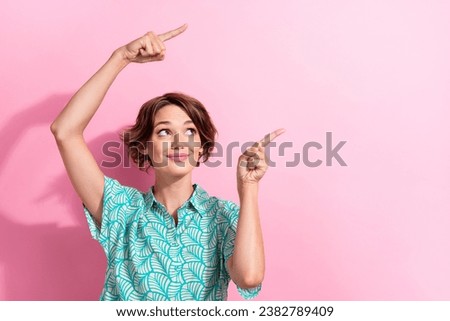 Photo of lovely nice girl look direct fingers empty space proposition blank isolated on pink color background