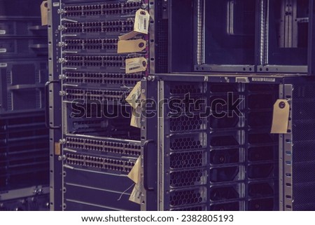 Marked and stored empty server cabinet after decommissioning 