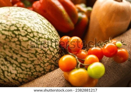 Close-Up of Cherry Tomatoes Among Farm Vegetables Royalty-Free Stock Photo #2382881217