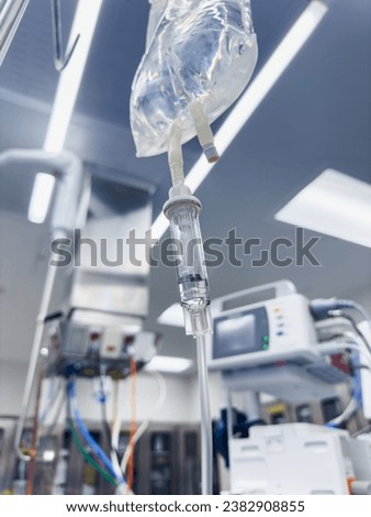 drug infusion drips, symbolizing the delicate balance of life and healing in healthcare settings