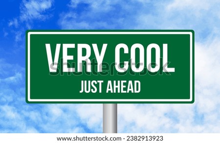 Very Cool just ahead road sign on sky background Royalty-Free Stock Photo #2382913923