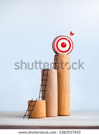 3d Target icon on wooden sticks bar graph chart steps with ladders to the top isolated on white background, vertical style, business market growth, effort, profit, investment, financial trend concept.