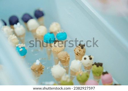 mini ice cream on cone inside a freeezer
