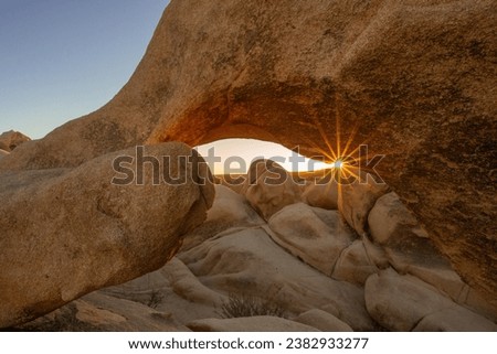 arch rock glowing in the sunset