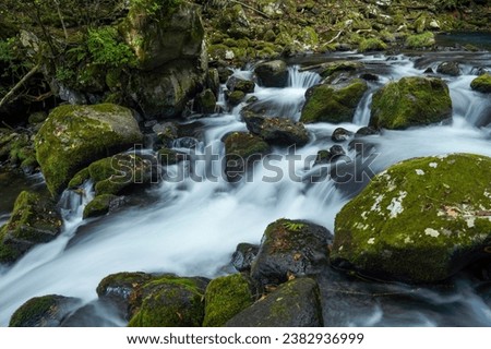 Scenery of the dynamic flow of the mountain stream of Tateshina Otaki waterfalls