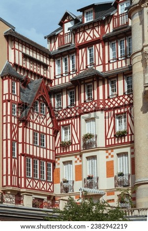 Facades of ancient medieval half-timbered houses. Rouen landscapes Royalty-Free Stock Photo #2382942219
