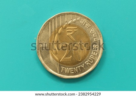 Closeup of a Rupee 20 coin of India. Royalty-Free Stock Photo #2382954229