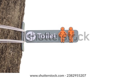 Public Restroom Sign tied to a tree, idea. isolated on white background with clipping path